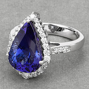 8.17 ctw. Genuine Tanzanite and 0.53 ctw. White Diamond Halo Ring in 18K White Gold by Haute Facets